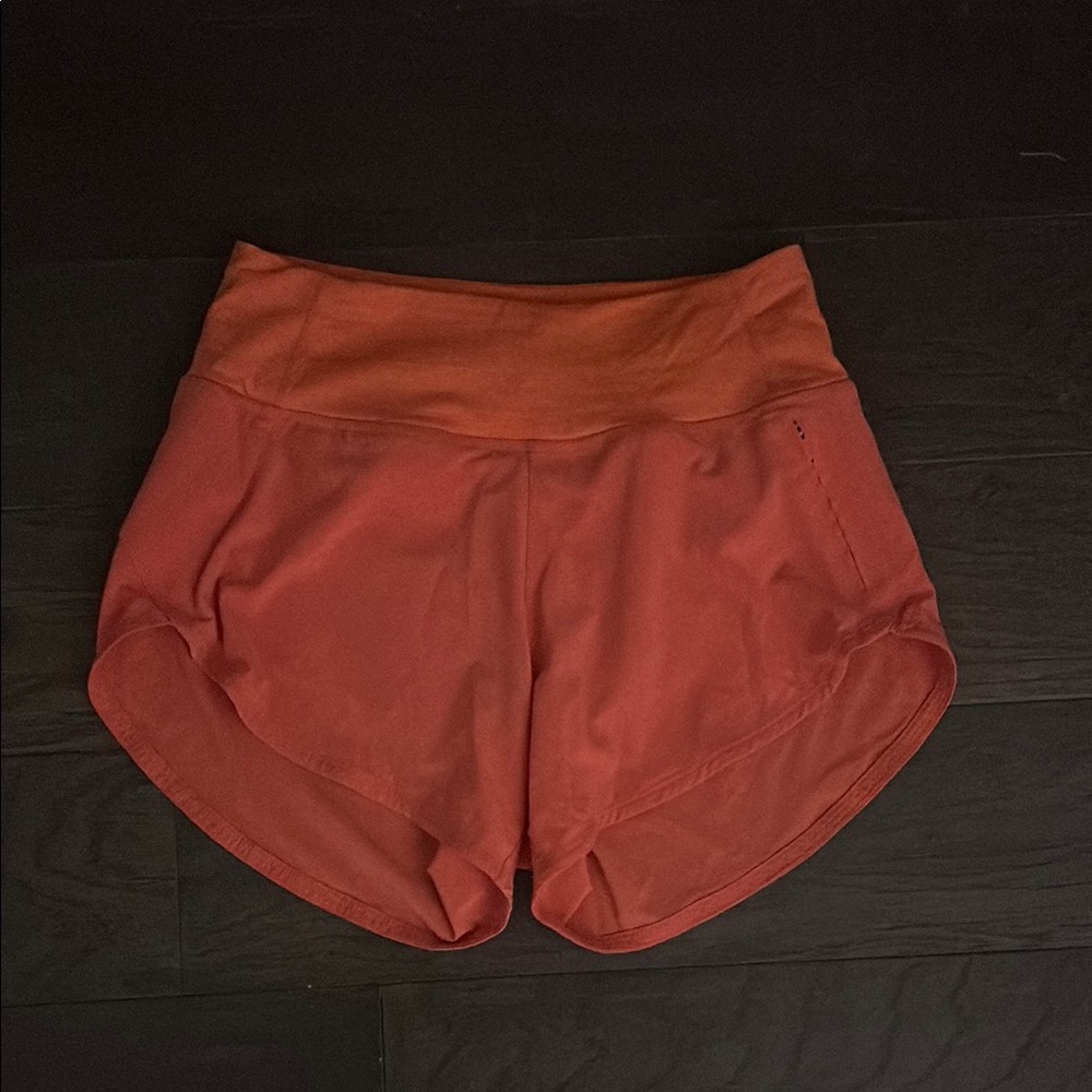 Orange outdoor voices 3 inch shorts